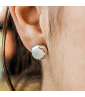 Silver button earrings.