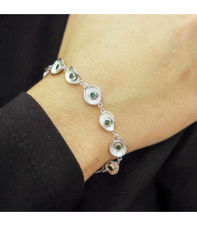 Silver bracelet with green zirconia