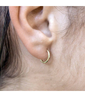 Glued gold hoop earrings