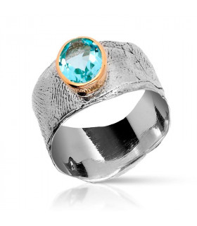 Wax ring with gold and topaz surround