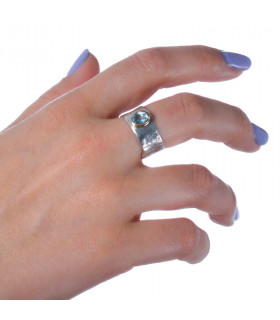 Precious wax ring with blue stone