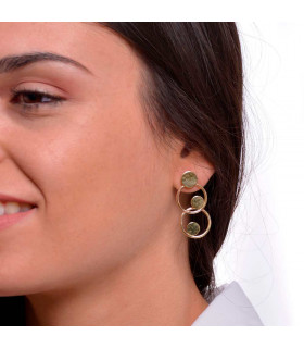 Woman with gold hoop earrings