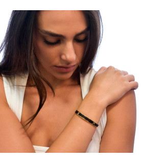 Women's gold bracelet with leather