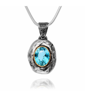 Berta necklace with aquamarine mounted in gold and silver base