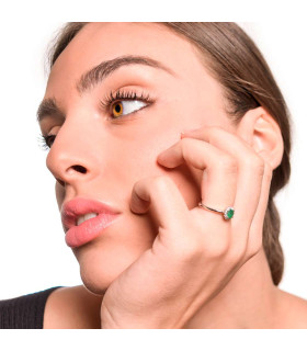 Emerald ring with diamond rosette.